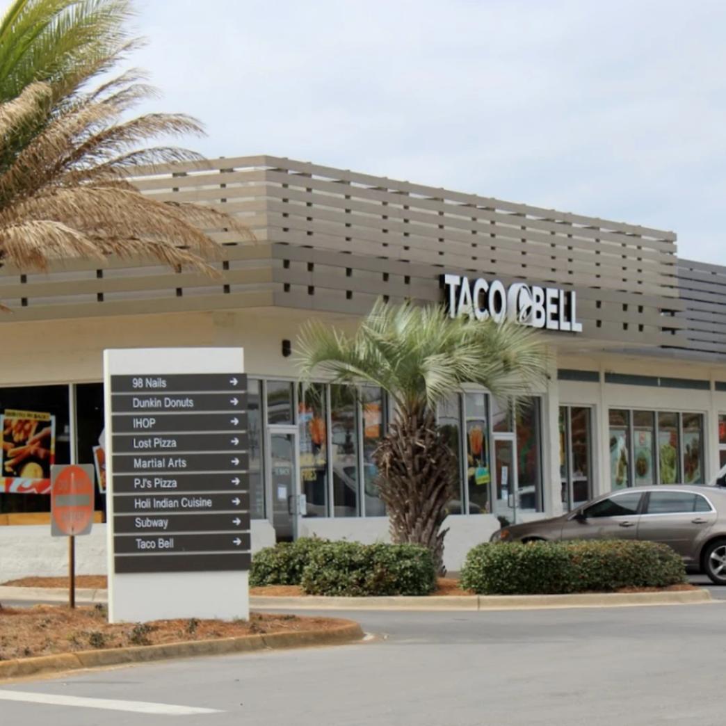 โลโก้ Taco Bell newstep new step work and travel Miramar Beach Florida