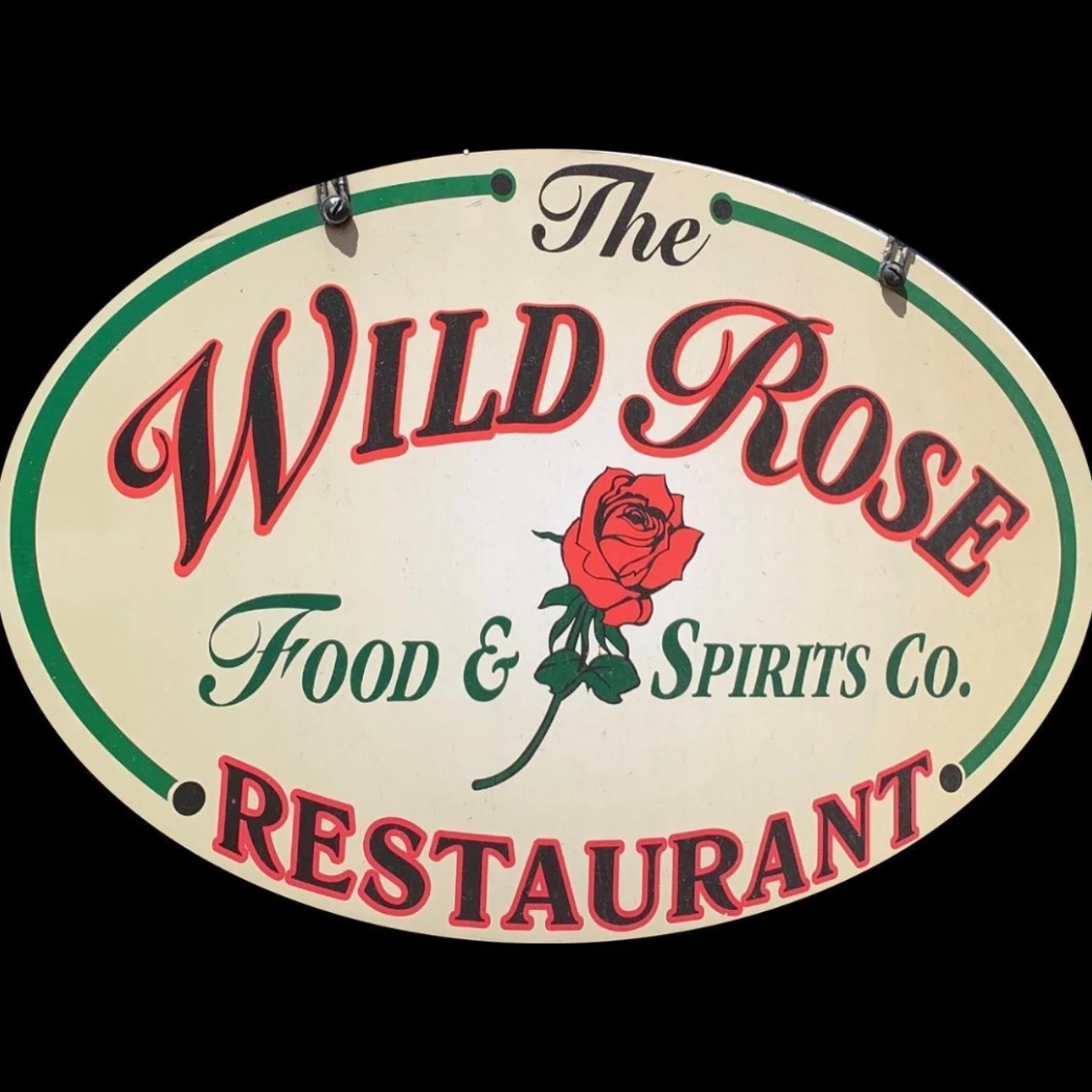 โลโก้ Wild Rose Restaurant newstep new step work and travel Estes Park Colorado